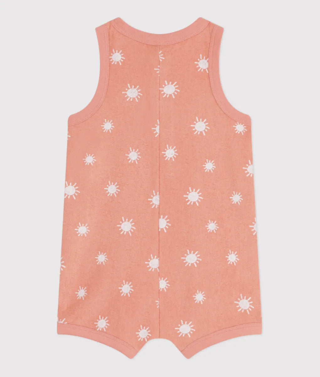Petit Bateau Kort mouwloos babypakje van katoenen badstof met zonnetjesprint