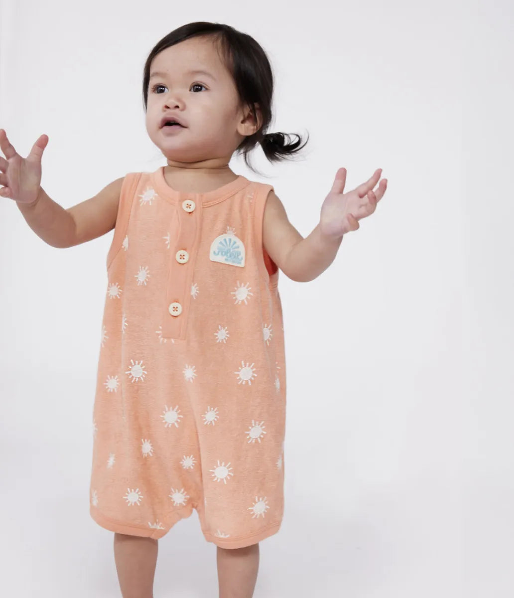 Petit Bateau Kort mouwloos babypakje van katoenen badstof met zonnetjesprint